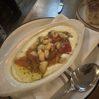 Angelinas - Cheese, tomatoes and garlic spread accompanying focaccia - New American Near Me - Rochester, New York