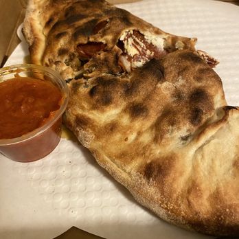Remo's Pizzeria  - Sausage Mushroom and Pepperoni Calzone - Pizza Near Me - Eastham, Massachusetts