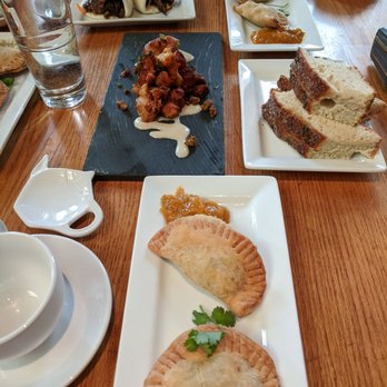 Boulder Dushanbe Teahouse - Samosas, char siu bao, crispy cauliflower, and bread for the table - Tea Rooms Near Me - Boulder, Colorado Boulder Dushanbe Teahouse - Samosas, char siu bao, crispy cauliflower, and bread for the table - Tea Rooms Near Me - Boulder, Colorado