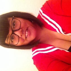 This is me with my new hair cut!! Thanks Delaina.. I don't know why my photo is side ways