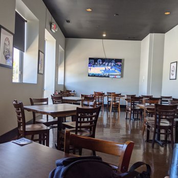 Angus Grill - tables and chairs in a restaurant - Burgers Near Me - Wilmington, North Carolina