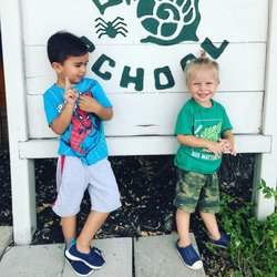 Discovery School - My boys at the sign!