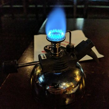 Jergel's Rhythm Grille - Cigar lighter in the cigar bar - American Near Me - Warrendale, Pennsylvania Jergel's Rhythm Grille - Cigar lighter in the cigar bar - American Near Me - Warrendale, Pennsylvania