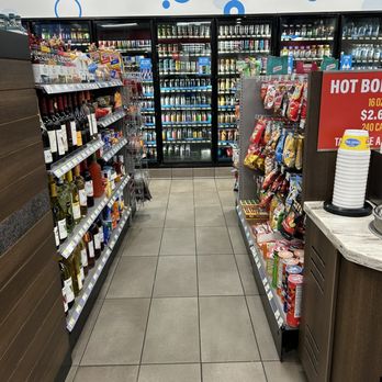 RaceTrac - a grocery store aisle with soda, water, energy, and hot dog - Gas Stations Near Me - Fayetteville, Georgia RaceTrac - a grocery store aisle with soda, water, energy, and hot dog - Gas Stations Near Me - Fayetteville, Georgia