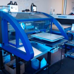 Elliott Imprinted Sportswear - The direct-to-garment printer, Kornit Breeze. Capable of printing full CMYK on a wide variety of garments.