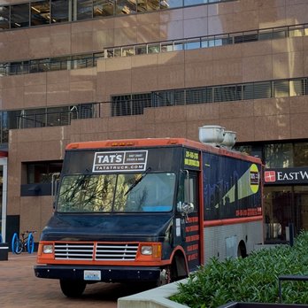 Tat's Delicatessen - a food truck parked in front of a building - Delis Near Me - Seattle, Washington Tat's Delicatessen - a food truck parked in front of a building - Delis Near Me - Seattle, Washington