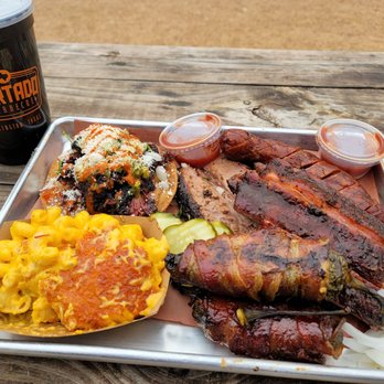Hurtado Barbecue - Big Red Barbacoa Tostada, Texas Twinkies, brisket, ribs, sausage and green chili mac. - Barbeque Near Me - Arlington, Texas