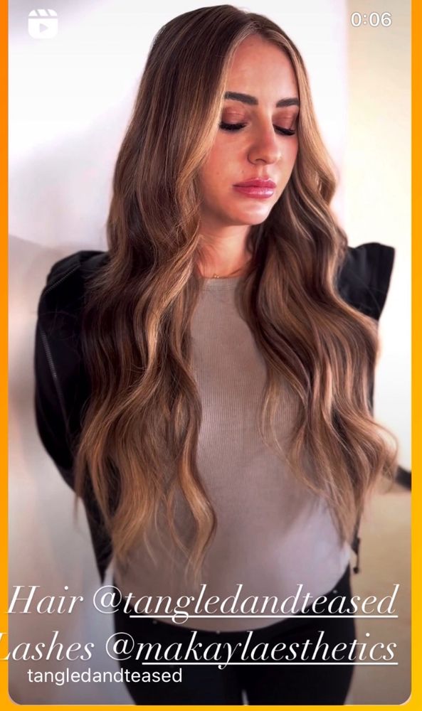 Tangled and Teased Salon Logo