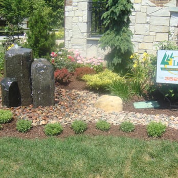 Lupfer Landscaping - a garden with a sign for lupfer landscaping - Landscaping Near Me - Lyons, Illinois