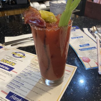 The Place - Bloody Mary with green onion, pepperoncini and slice of bacon. - Breakfast & Brunch Near Me - Glendale, Arizona The Place - Bloody Mary with green onion, pepperoncini and slice of bacon. - Breakfast & Brunch Near Me - Glendale, Arizona