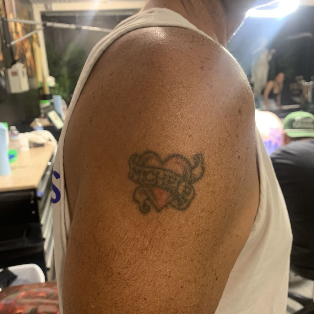 The Speakeasy Tattoo - Old heart tattoo with ex wife's name on it. - Tattoo Near Me The Speakeasy Tattoo - Old heart tattoo with ex wife's name on it. - Tattoo Near Me
