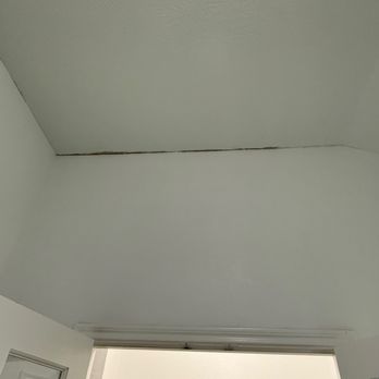 Guaranteed Painting - A "finished" room according to the previous painters - Painters Near Me - Bryan, Texas