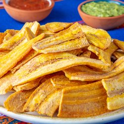 Fuego Empanadas - Lightly seasoned plantain chips served with our signature Fuego Salsa.
