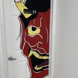Think Ink Tattoo and Piercing - Bathroom art work !