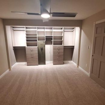 Closets To Go - Next, we unboxed everything and laid it all out. We designed the shelving around the safe. - Home Organization Near Me - Tigard, Oregon