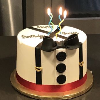 Ladybug Baking - a birthday cake with candles - Cupcakes Near Me Ladybug Baking - a birthday cake with candles - Cupcakes Near Me