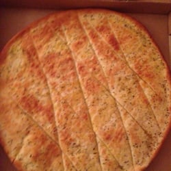 Aroma Pizza House - Garlic pizza.  Seems excessive, but it isn't.  Eat other pizza cold for breakfast, finish this one off whilst warm!