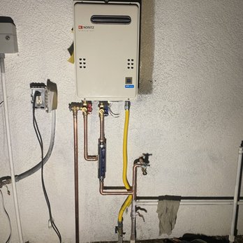 Back In A Flush - Noritz tankless outside of pool house - Water Heater Installation/Repair Near Me Back In A Flush - Noritz tankless outside of pool house - Water Heater Installation/Repair Near Me