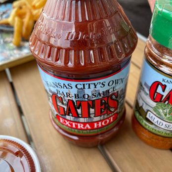 Gates Bar-B-Q - ows two bottles of barbecue sauce - Barbeque Near Me - Independence, Missouri