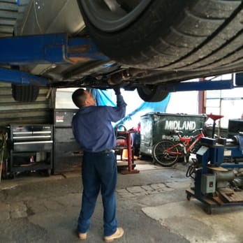 King Muffler - Removing the old flex pipe from the DC headers - Auto Repair Near Me - New York, New York