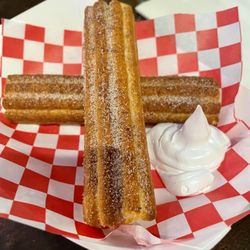 The Drawing Board - Cream filled churros with a side of Bavarian cream