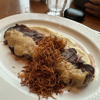 Front & Main - Steak with mashed potatoes and crispy onions. - Bars Near Me - Waterville, Maine