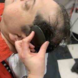 Cut 'N' Up Barbershop - Facial massage