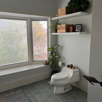 GT Renovations - a bathroom with a toilet and a window - General Contractors Near Me GT Renovations - a bathroom with a toilet and a window - General Contractors Near Me