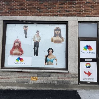 SeducZone/ Boutique LGBT - Left side of the shop, showing store sign and promotional design - Adult Shops Near Me - Montreal, Quebec SeducZone/ Boutique LGBT - Left side of the shop, showing store sign and promotional design - Adult Shops Near Me - Montreal, Quebec