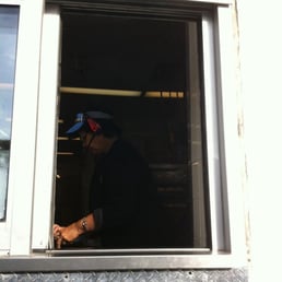 a man looking out of a window