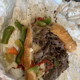 Italian beef after eating about half of it. Looks messy but it's good.