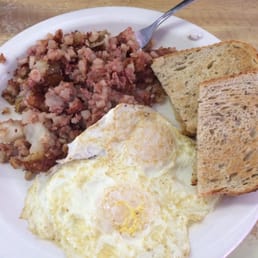 Corn beef hash and eggs with rye toast. Delish! Corn beef hash and eggs with rye toast. Delish!