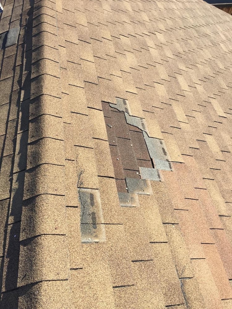 Slide of The Roof Repair Guy