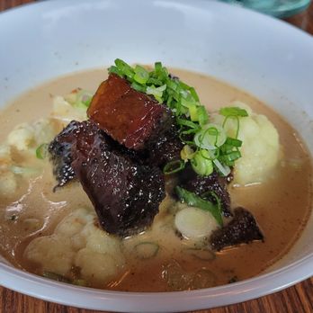 Eem - White curry with brisket burnt ends - Cocktail Bars Near Me - Portland, Oregon Eem - White curry with brisket burnt ends - Cocktail Bars Near Me - Portland, Oregon