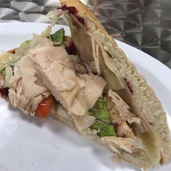 Paramount Cafe - 1/2 of the Thanksgiving Turkey sandwich with cream cheese and jelly cranberry - Cafes Near Me - Arlington, Virginia