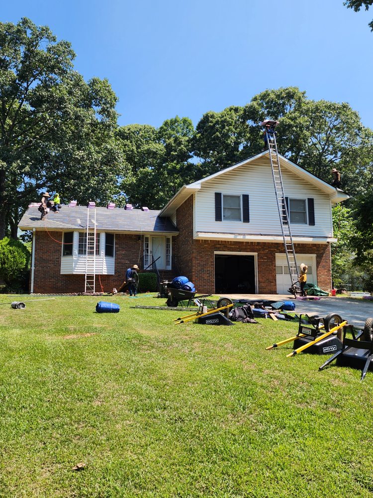 Slide of The Roofing Specialists