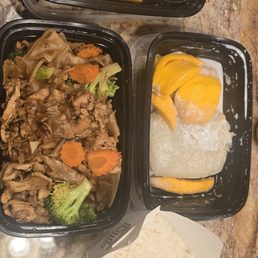 Pad see ew(chicken), fried tofu, white rice, and mango sticky rice Pad see ew(chicken), fried tofu, white rice, and mango sticky rice