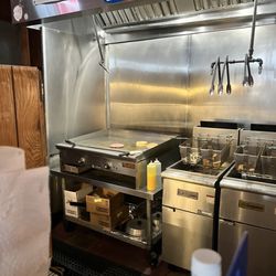 TR's Front Row On Greenwood - Where the magic happens at the end of the bar