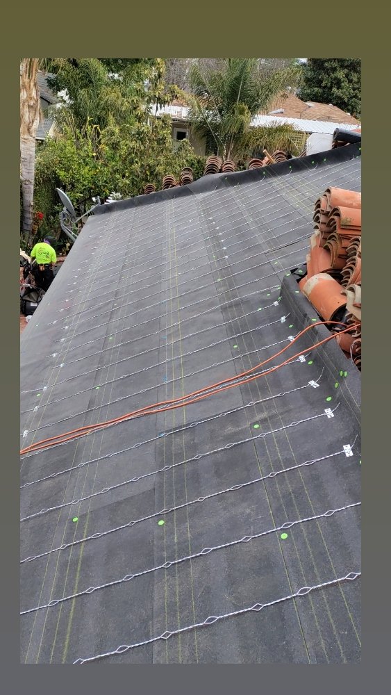 Slide of NRG Roofing