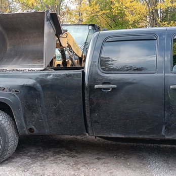 Jb & Sw Property Management - a truck with its bed open - Lawn Services Near Me Jb & Sw Property Management - a truck with its bed open - Lawn Services Near Me