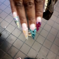 This Lady, their fingernails are just as pretty as mine, we have 2 things in common we keep our nails dripping and our craving 4 chicken!