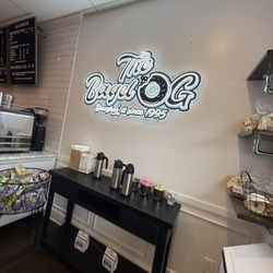 Bar Bagel - The company's fun logo , along with shelves of homemade bagel chips and sugars , creamer , etc