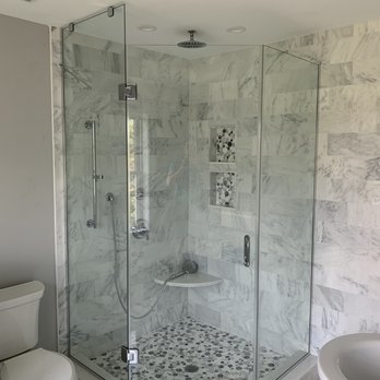 MG Builders - a bathroom with a glass shower - General Contractors Near Me - Edison, New Jersey
