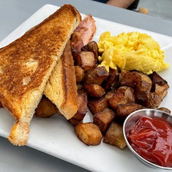 Barking Mad Cafe - Meat lover breakfast.  My friend liked it! - Coffee & Tea Near Me - Gaithersburg, Maryland