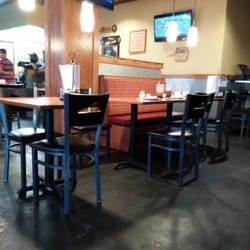 Pizza Hut - This table has been dirty a hour a a half theres only one waitress and a whole bunch of kitchen people no help worst visit ever