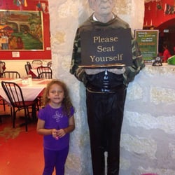 Mague's Cafe - Entertaining being greeted by this guy at the door!