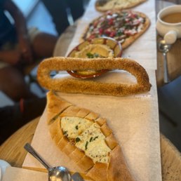 a long table with a variety of food items a long table with a variety of food items