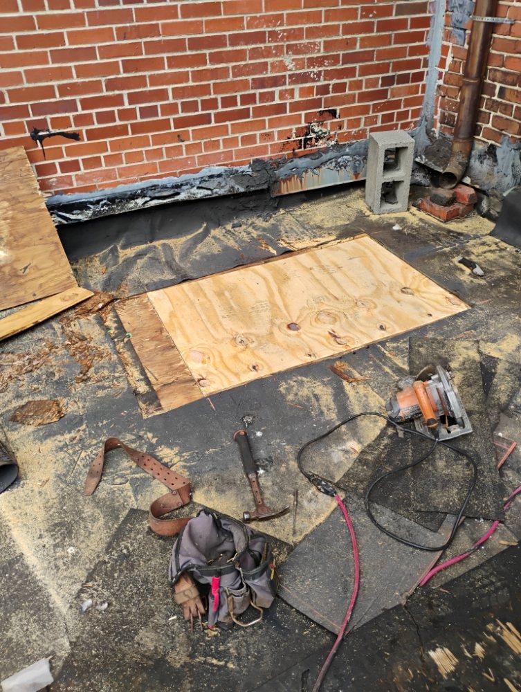 Slide of TCB Roofing