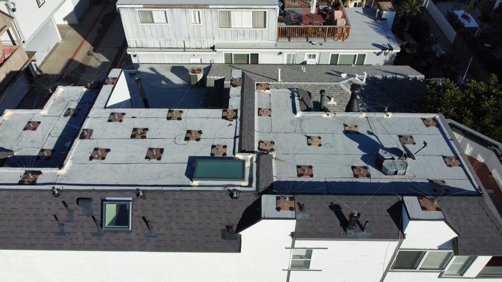 Slide of Araujo Roofing