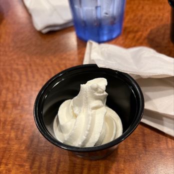 Sizzler - a bowl of whipped cream on a table - Seafood Near Me - Colma, California